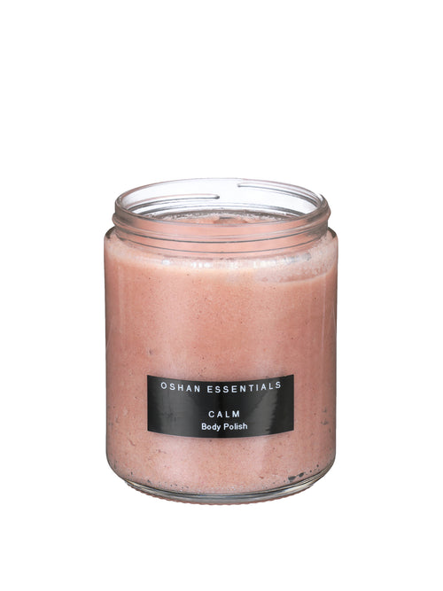 Open glass jar of rose-colored OSHAN CALM ʻĀKALA Body Polish on white.