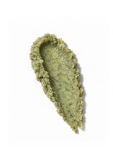 Green swatch of OSHAN DETOX ʻŌMAʻOMAʻO Body Polish with visible salt and sugar grains.