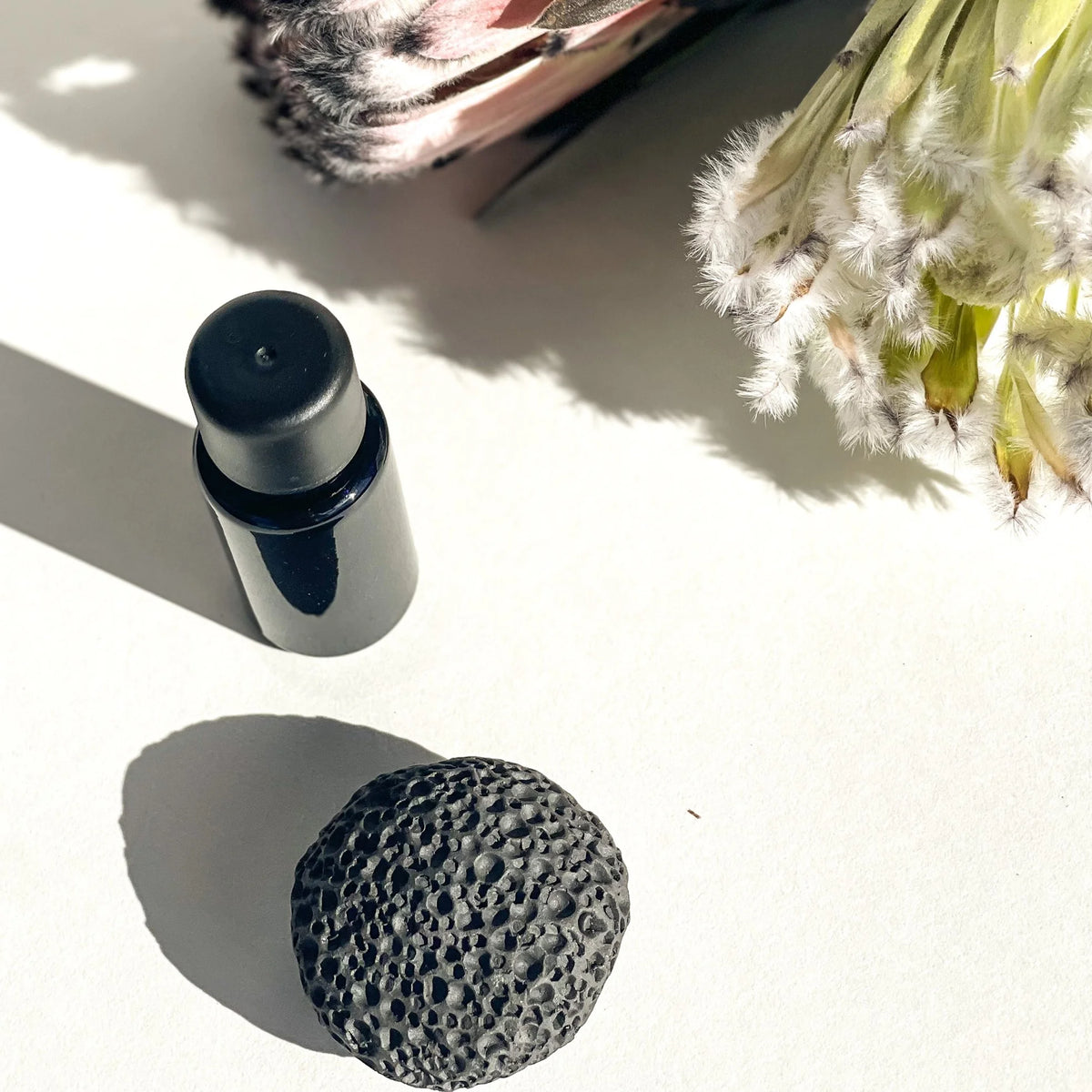 OSHAN PELE Rock Aromatherapy Diffuser, a handmade ceramic lava rock diffuser made on Maui.