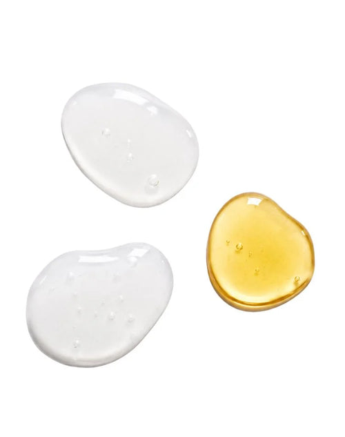 Texture swatches of the PALUPALU hydration serum and the golden ʻŌPIO face oil from the OSHAN Absolute Hydration Set.
