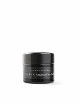 OSHAN ʻĀLANA Radiance Face Soufflé in its black jar on a white background.
