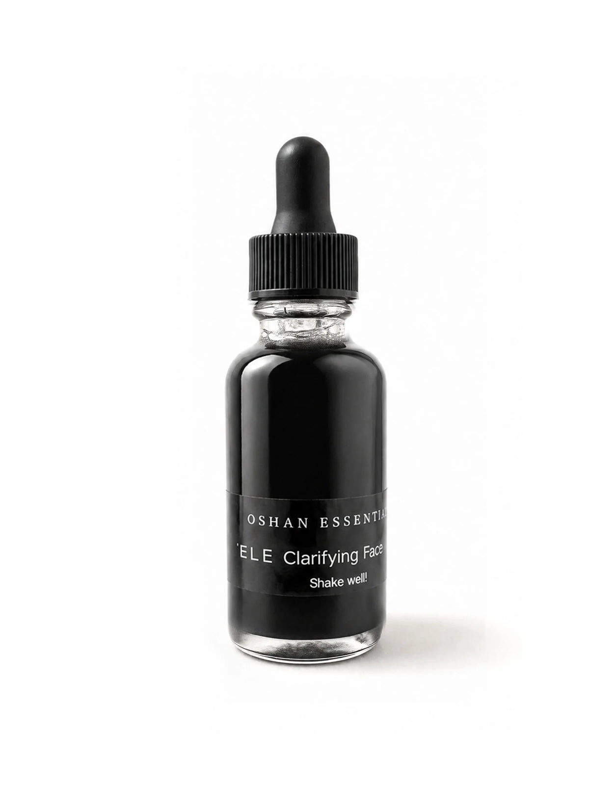 OSHAN ʻELE Clarifying Face Wash in its black dropper bottle on a white background.