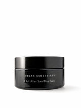 OSHAN KAI After Sun Bliss Balm in its black jar on a white background.