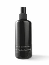 OSHAN KAI After Sun Rescue Milk in its black spray bottle on a white background.