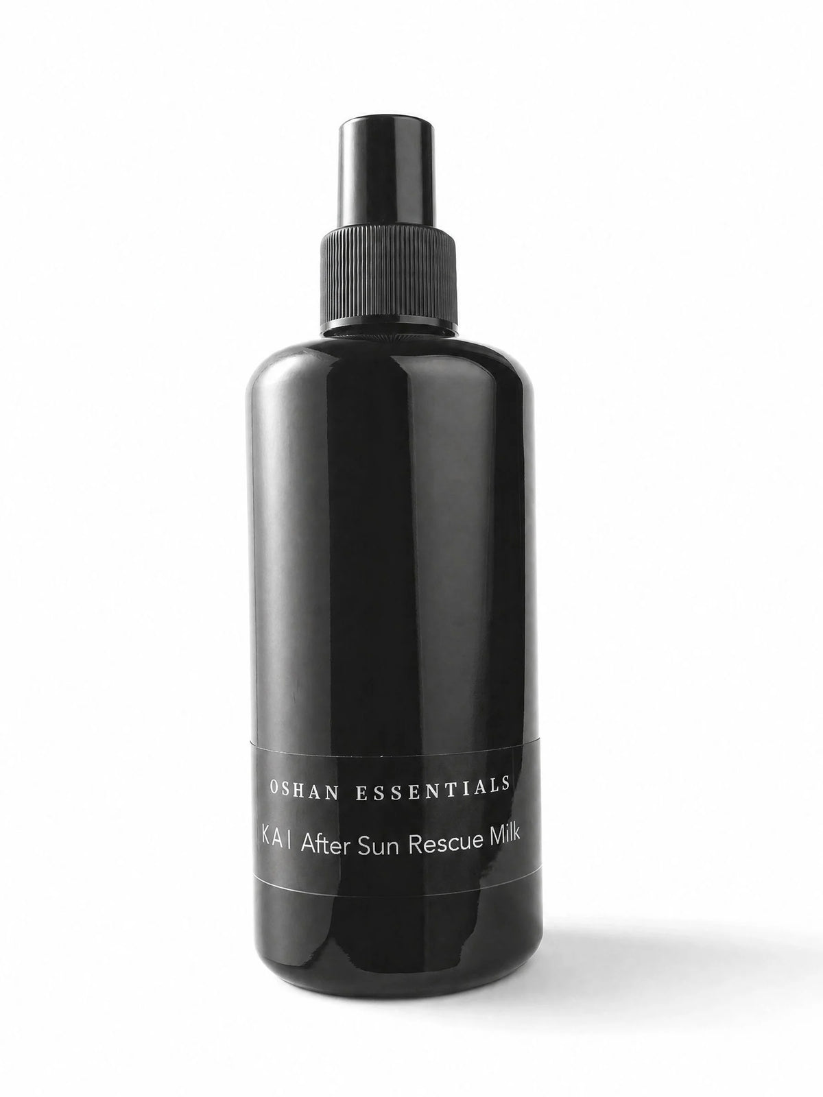 OSHAN KAI After Sun Rescue Milk in its black spray bottle on a white background.