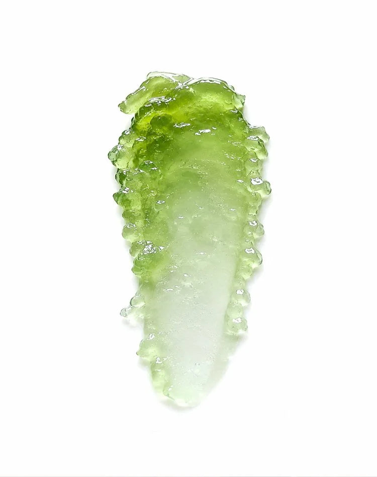 Texture swatch of the green OSHAN LĪHAU Restoring Gelée on white.