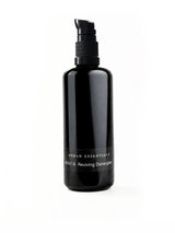 OSHAN MAIʻA Reviving Leave-In Conditioner in its black pump bottle on white.