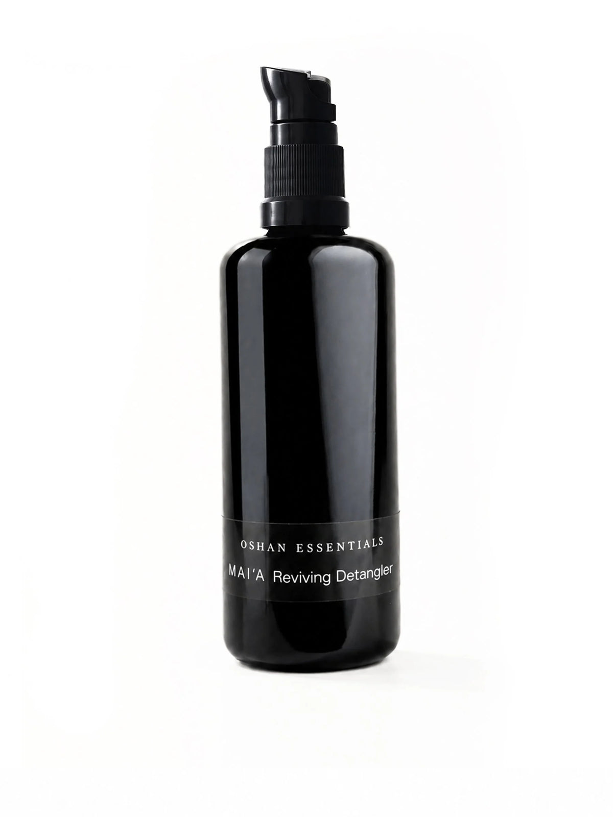 OSHAN MAIʻA Reviving Leave-In Conditioner in its black pump bottle on white.
