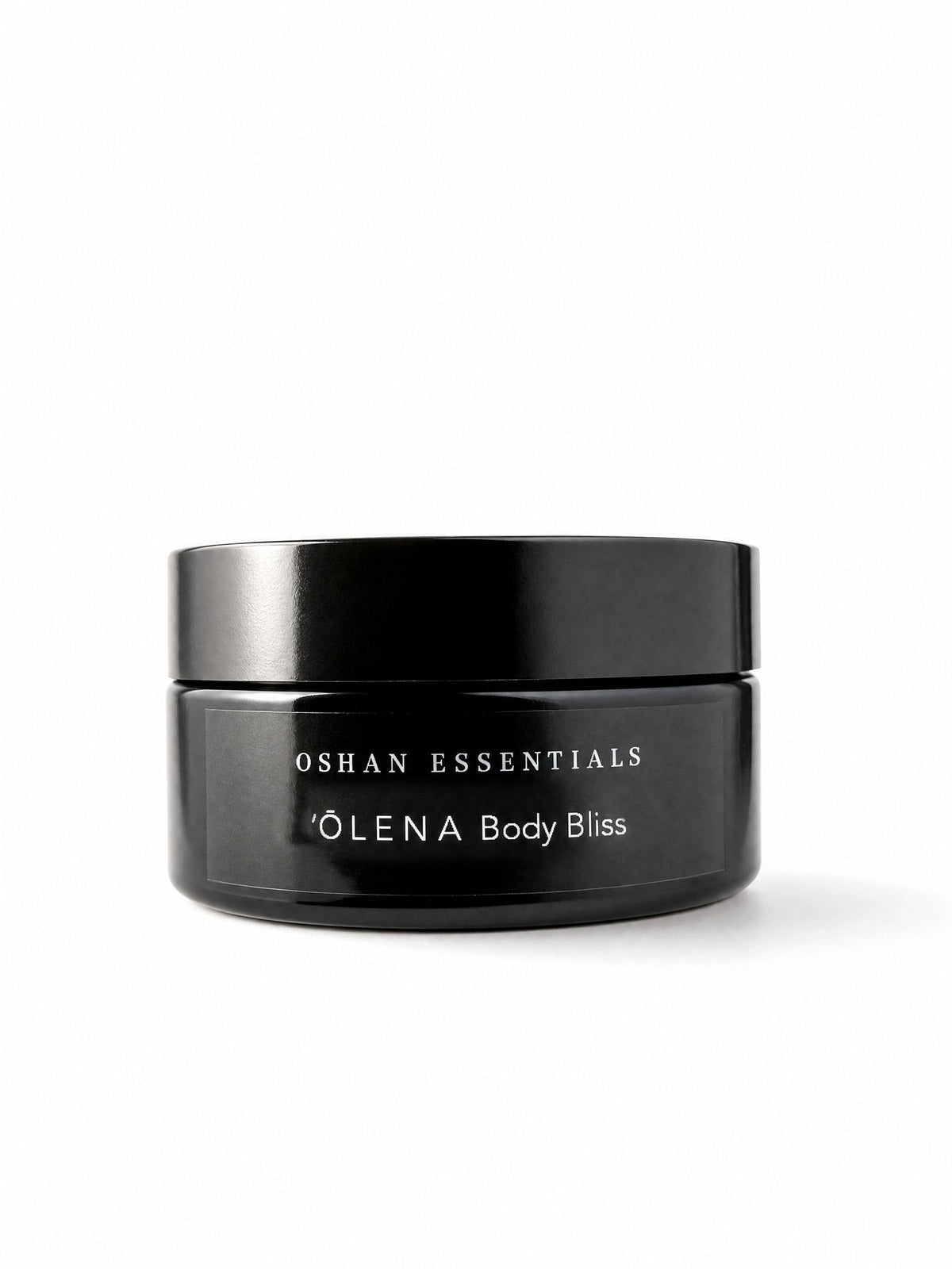 OSHAN ʻŌLENA Body Bliss Balm in its black jar on a white background.