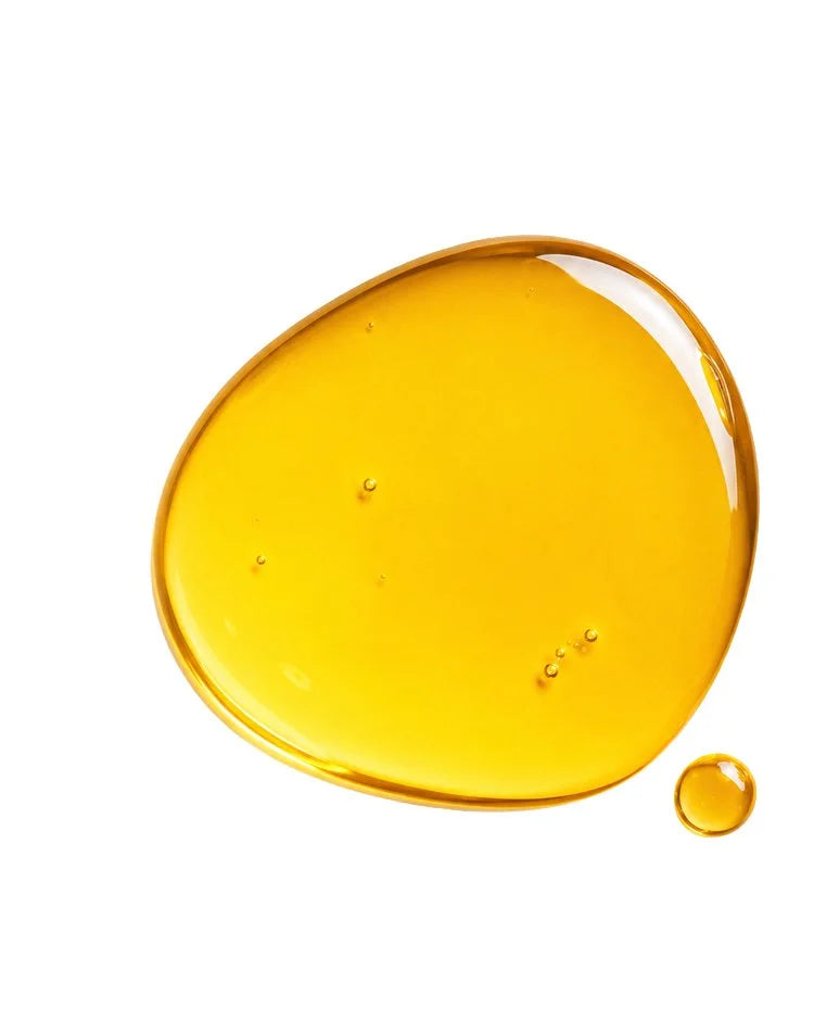 Texture swatch of the golden OSHAN ʻŌPIO Youth Manoʻi face oil.